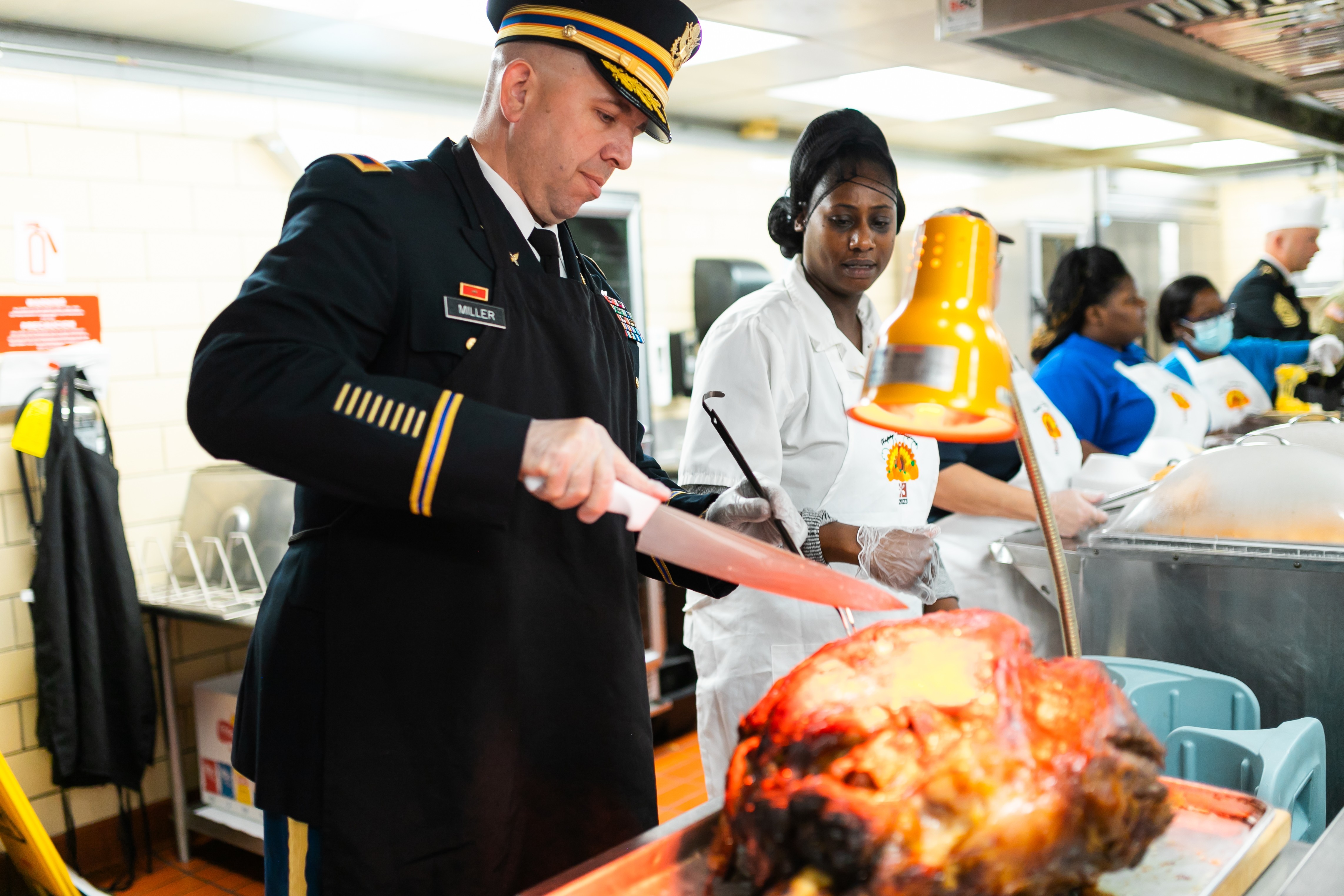 Fort Novosel leaders serve up food and fellowship for a DFAC